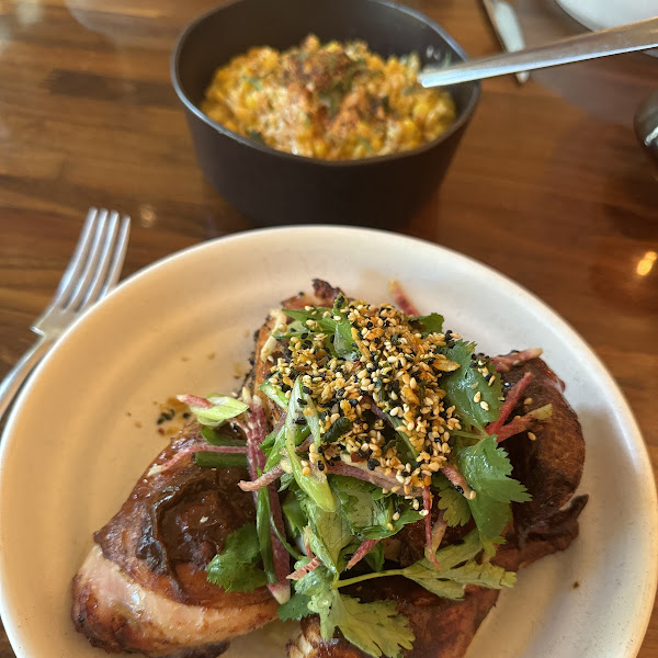 ATX Cocina signature dishes BrusselsHamachi CrudoRed Chile Roasted Chicken